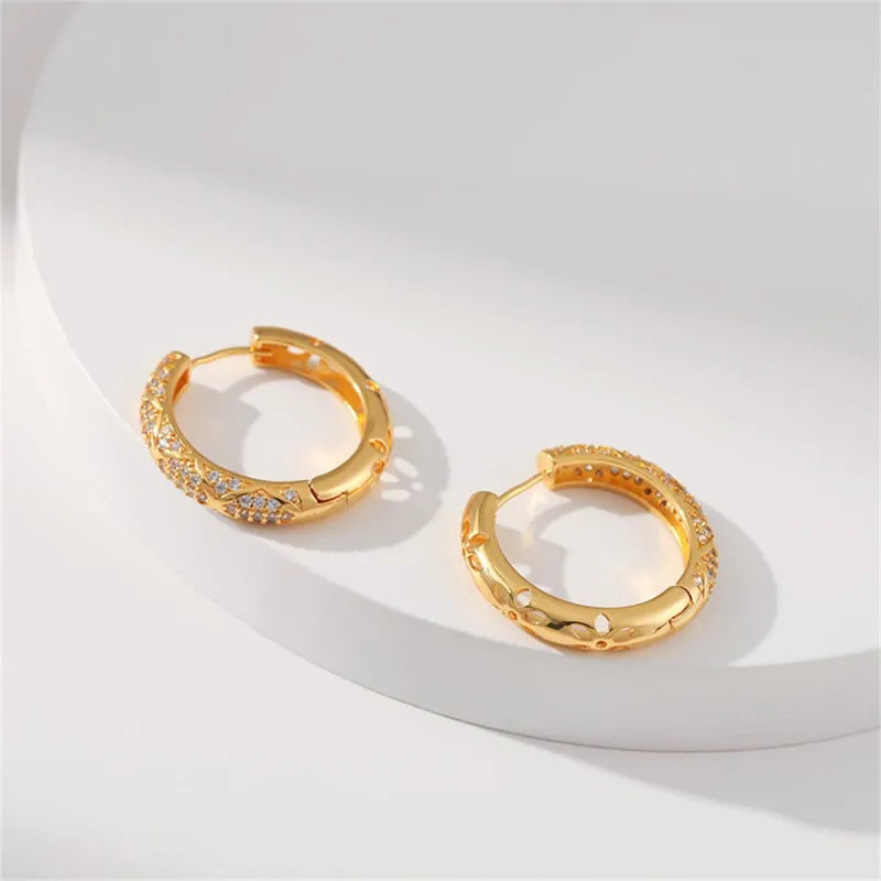 Cubic Zirconia & Goldtone Huggie Earring made by Zulily