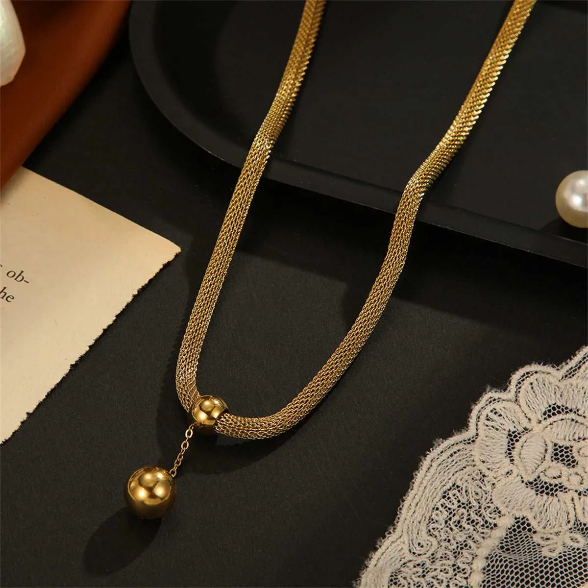Goldtone Ball Mesh Chain Pendant Necklace sold by Zulily product image thumbnail 2