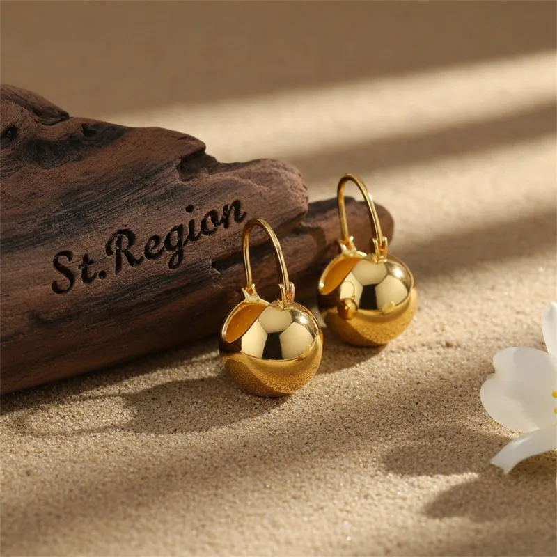 Goldtone Ball Huggie Earrings made by Zulily