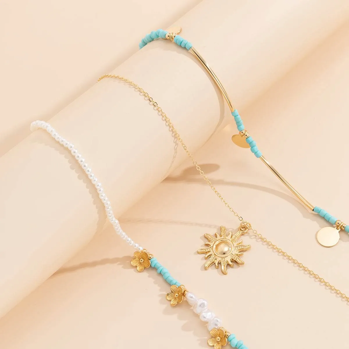 Howlite & Pearl Goldtone Sun Pendant Necklace Set sold by Zulily product image thumbnail 2