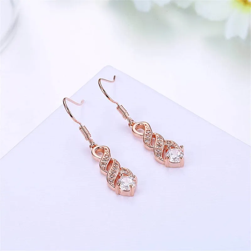Cubic Zirconia & Rose Goldtone Twisted Drop Earrings made by Zulily
