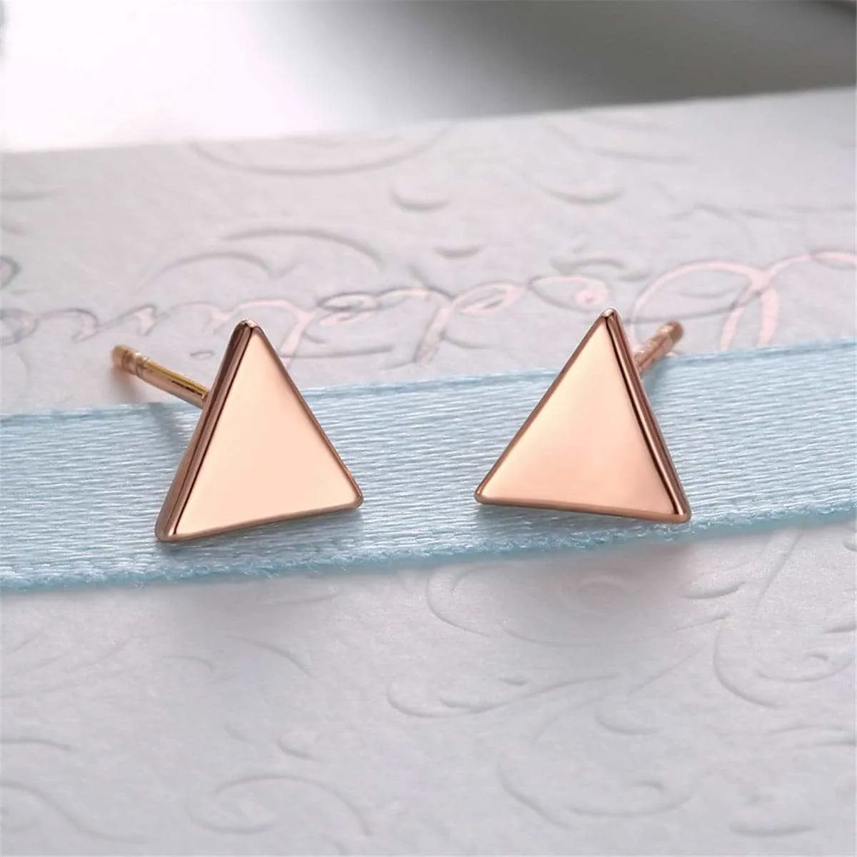 Rose Goldtone Triangle Stud Earrings sold by Zulily product image thumbnail 2