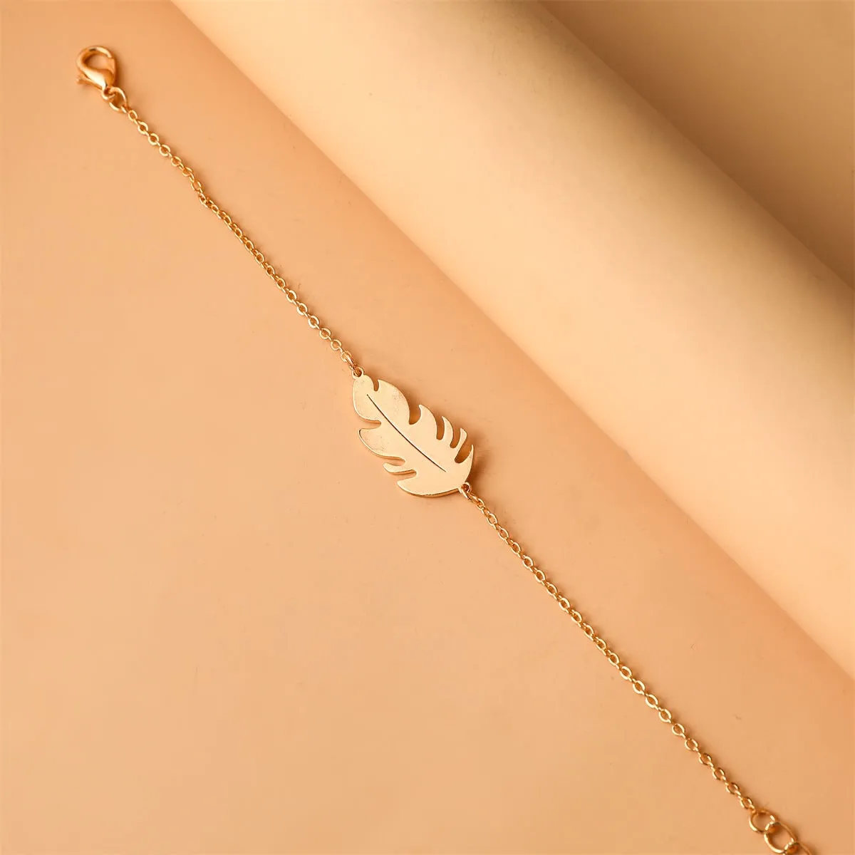 Goldtone Leaf Charm Bracelet sold by Zulily product image thumbnail 5