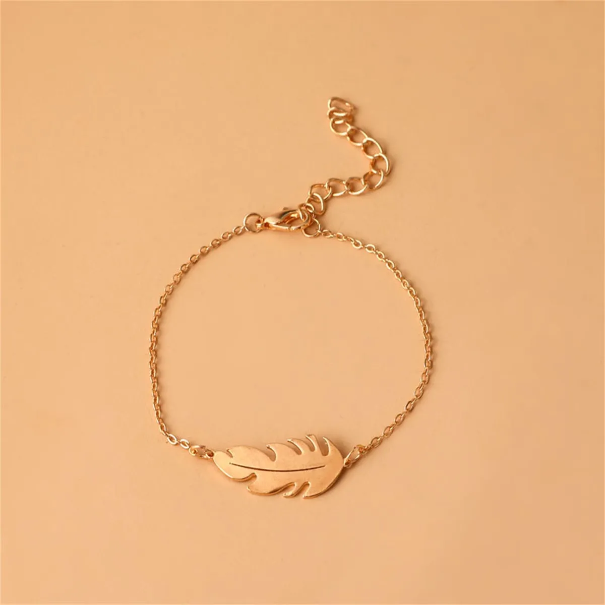 Goldtone Leaf Charm Bracelet sold by Zulily product image thumbnail 4