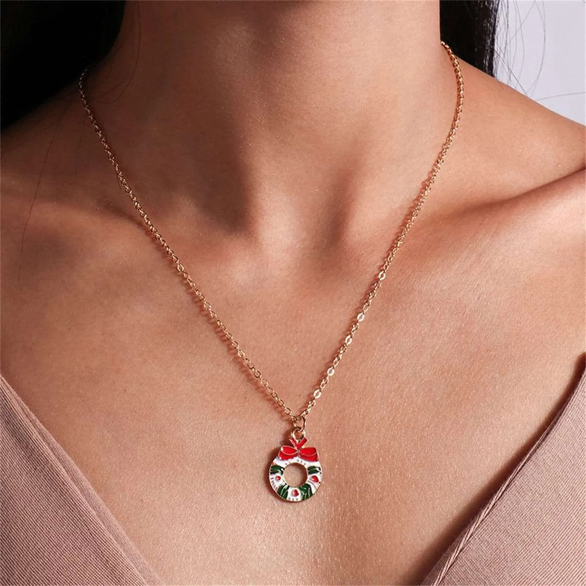 Green & Red Wreath Pendant Necklace sold by Zulily