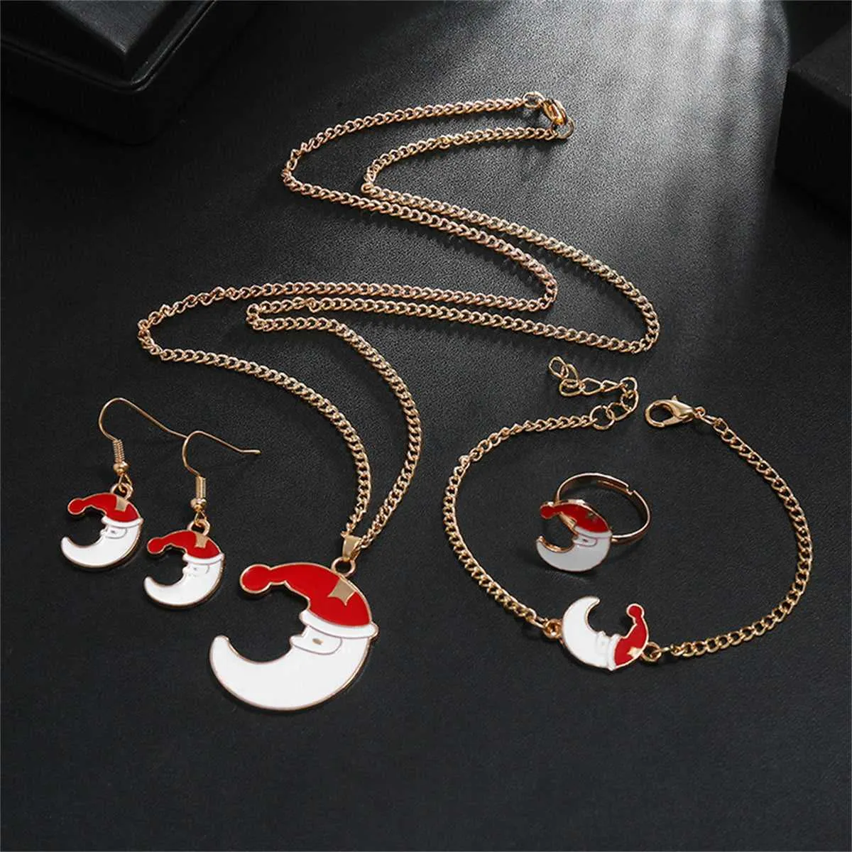 Red & White Santa Moon Pendant Necklace Set sold by Zulily product image thumbnail 2