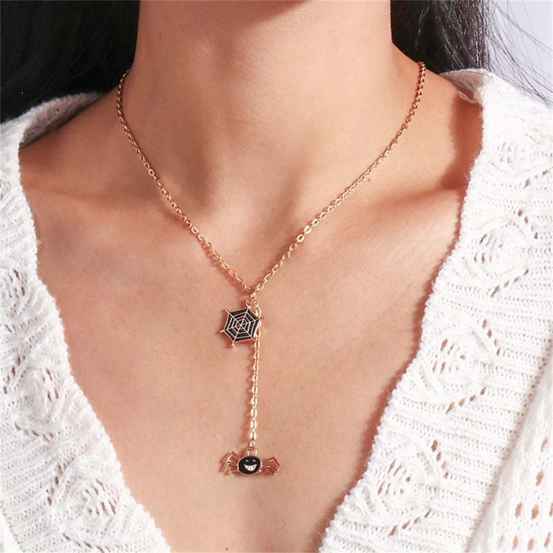 Goldtone & Black Enamel Spiderweb Pendant Necklace made by Zulily