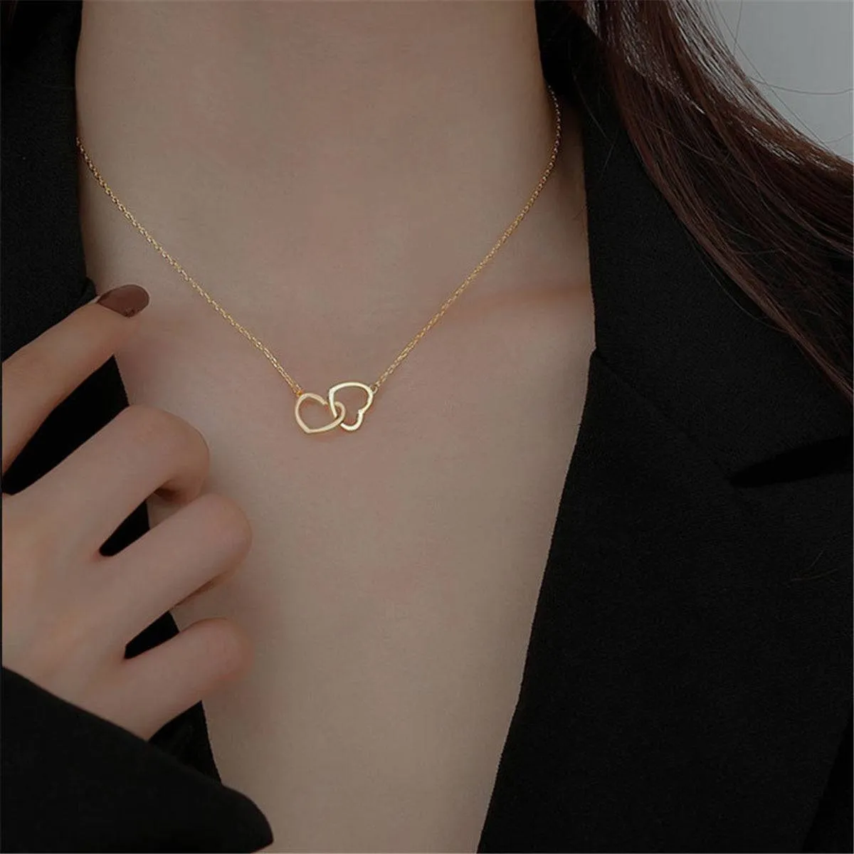 Goldtone Interlocking Heart Pendant Necklace sold by Zulily product image thumbnail 2