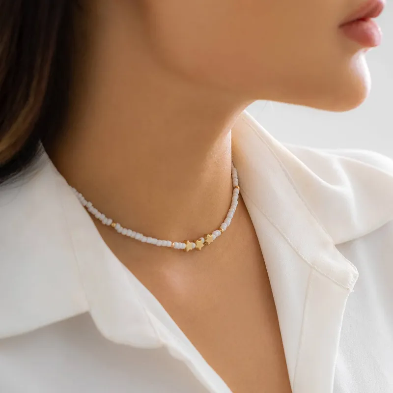 White Howlite & Goldtone Star Beaded Pendant Necklace made by Zulily