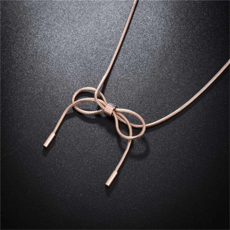 Rose Goldtone Bow Pendant Necklace made by Zulily