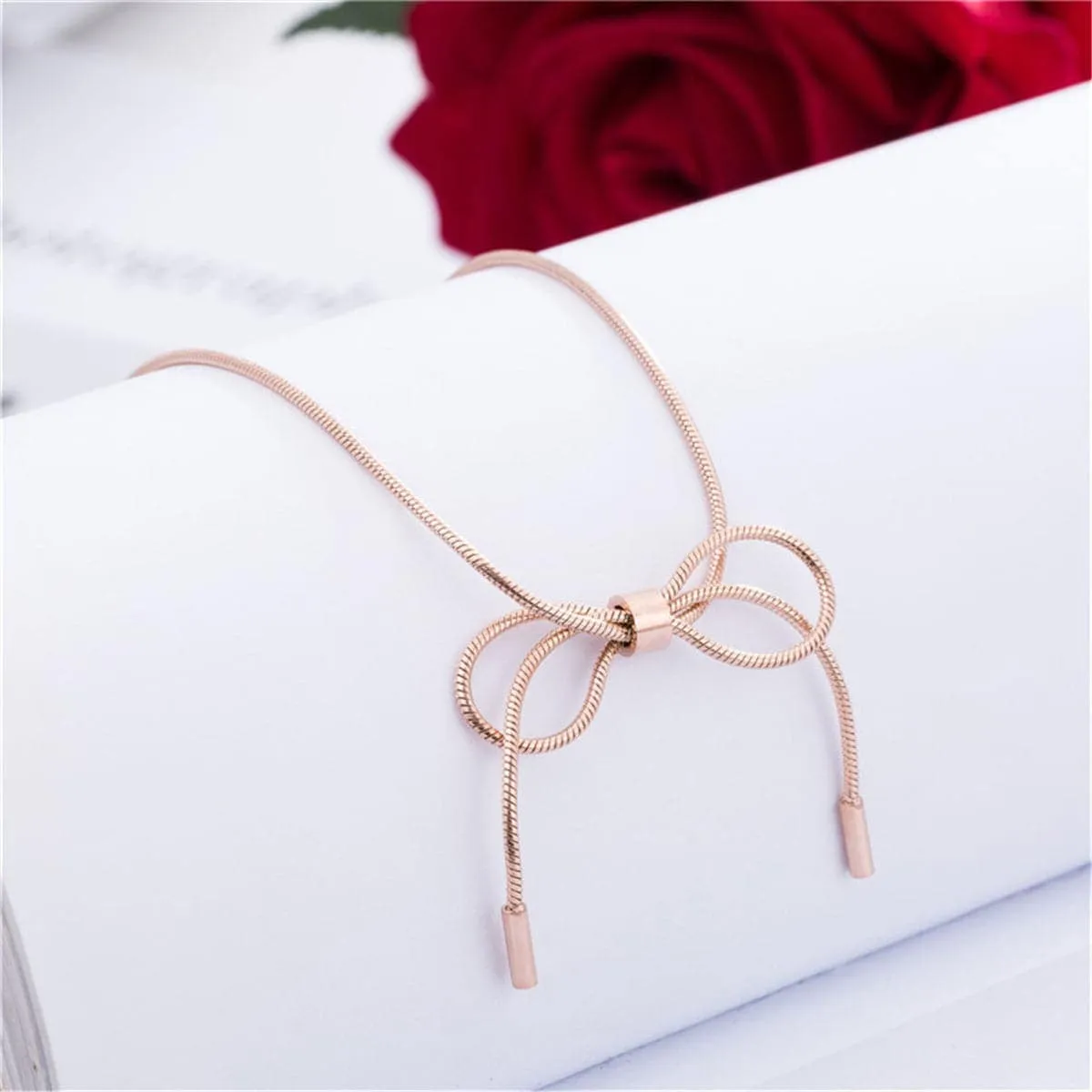 Rose Goldtone Bow Pendant Necklace sold by Zulily product image thumbnail 3
