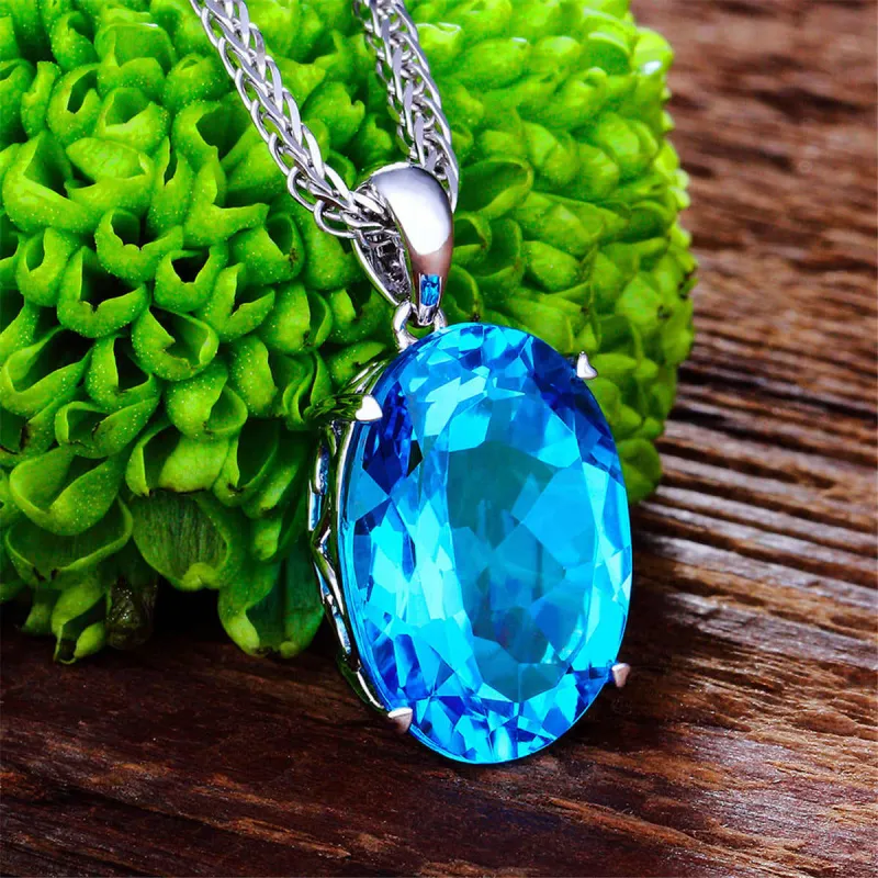 Blue Crystal & Silvertone Oval-Cut Pendant Necklace made by Zulily