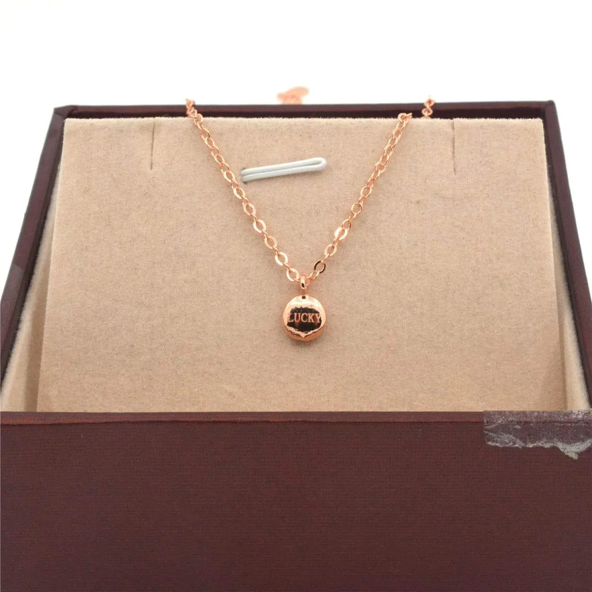 Rose Goldtone 'Lucky' Round Pendant Necklace sold by Zulily product image thumbnail 2