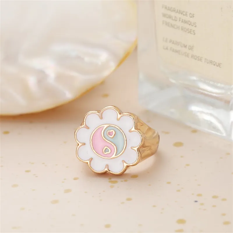 White Enamel & Goldtone Yin Yang Flower Ring made by Zulily