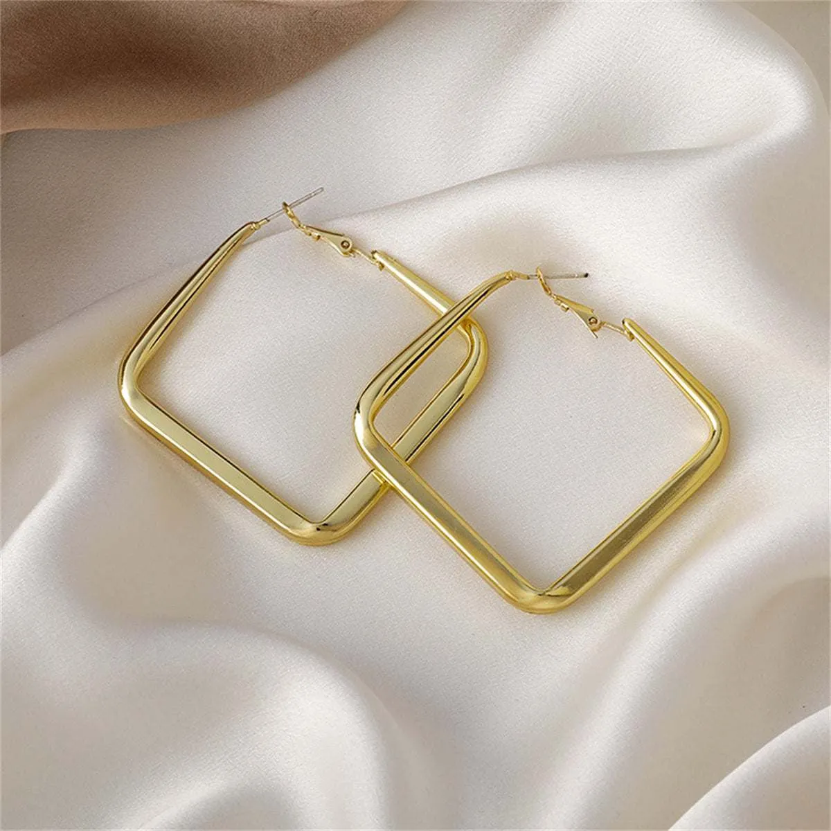 Goldtone Open Square Hoop Earrings sold by Zulily