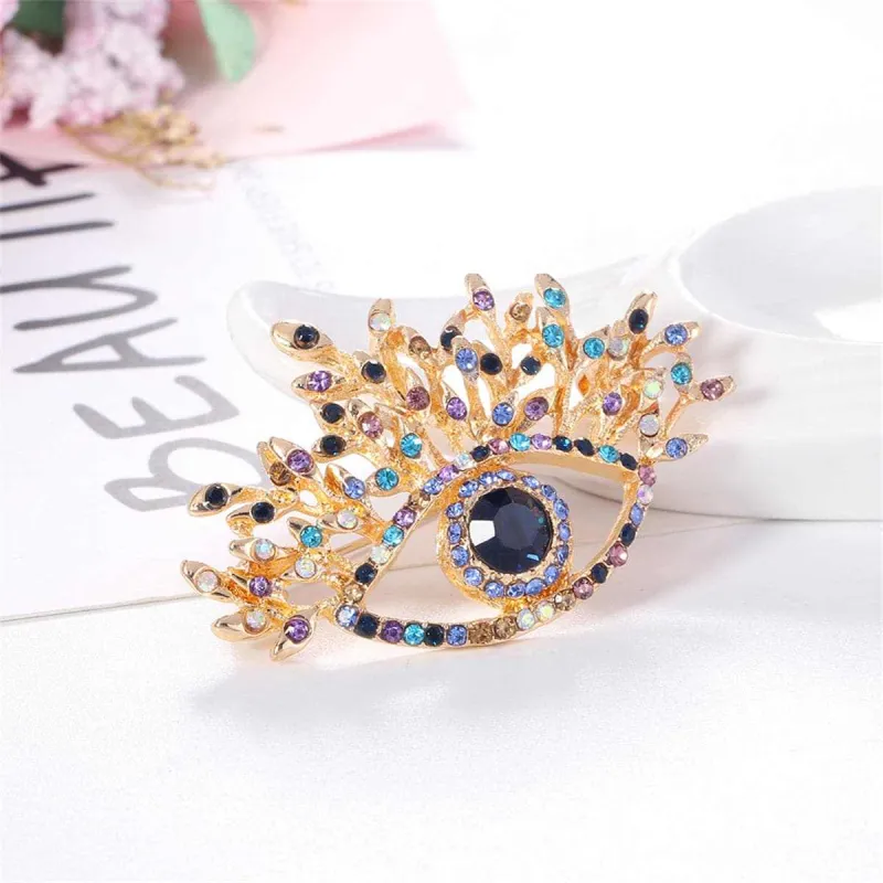 Blue Crystal & Multicolor Cubic Zirconia Goldtone Eye Brooch made by Zulily