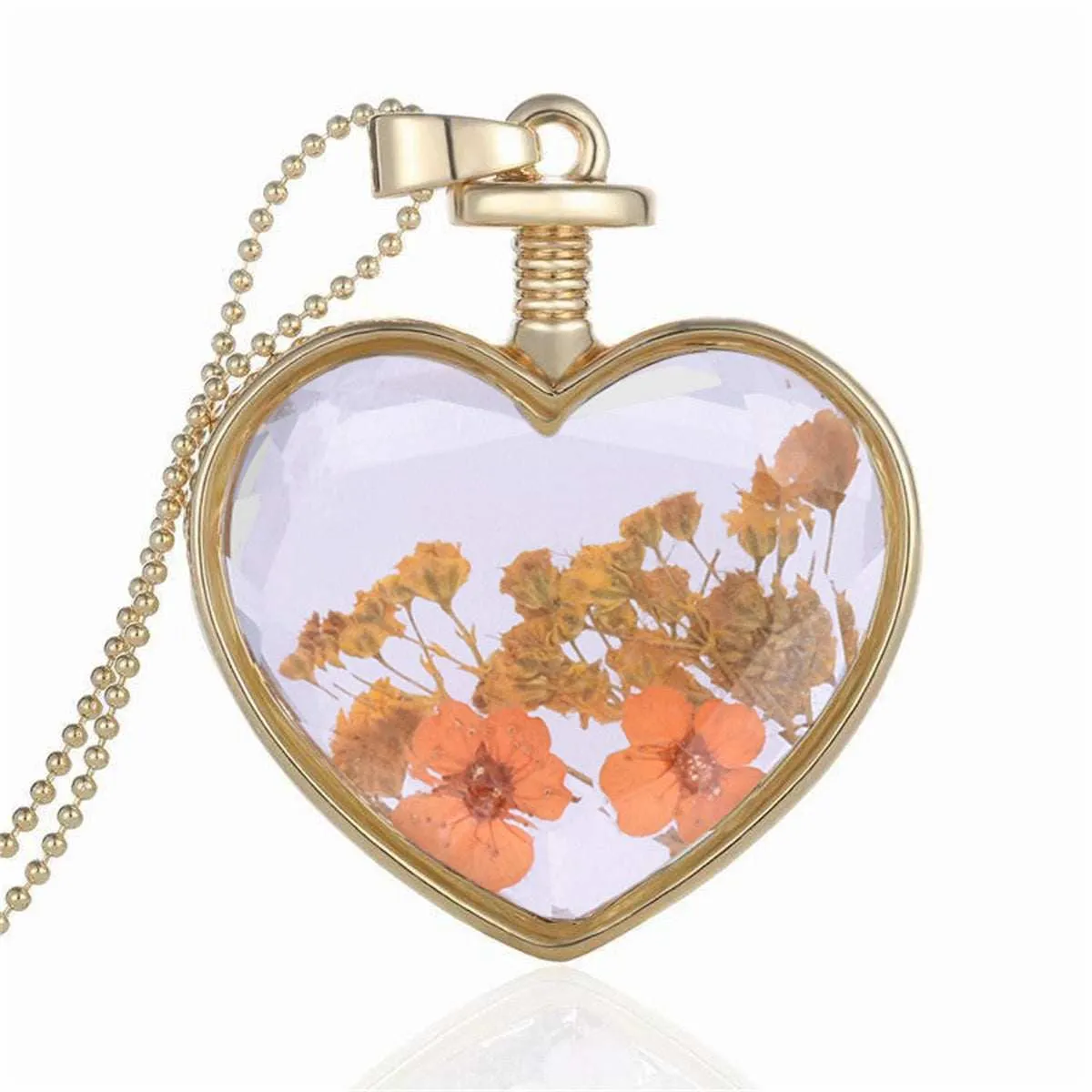 Peach Pressed Flower & Goldtone Heart Pendant Necklace sold by Zulily