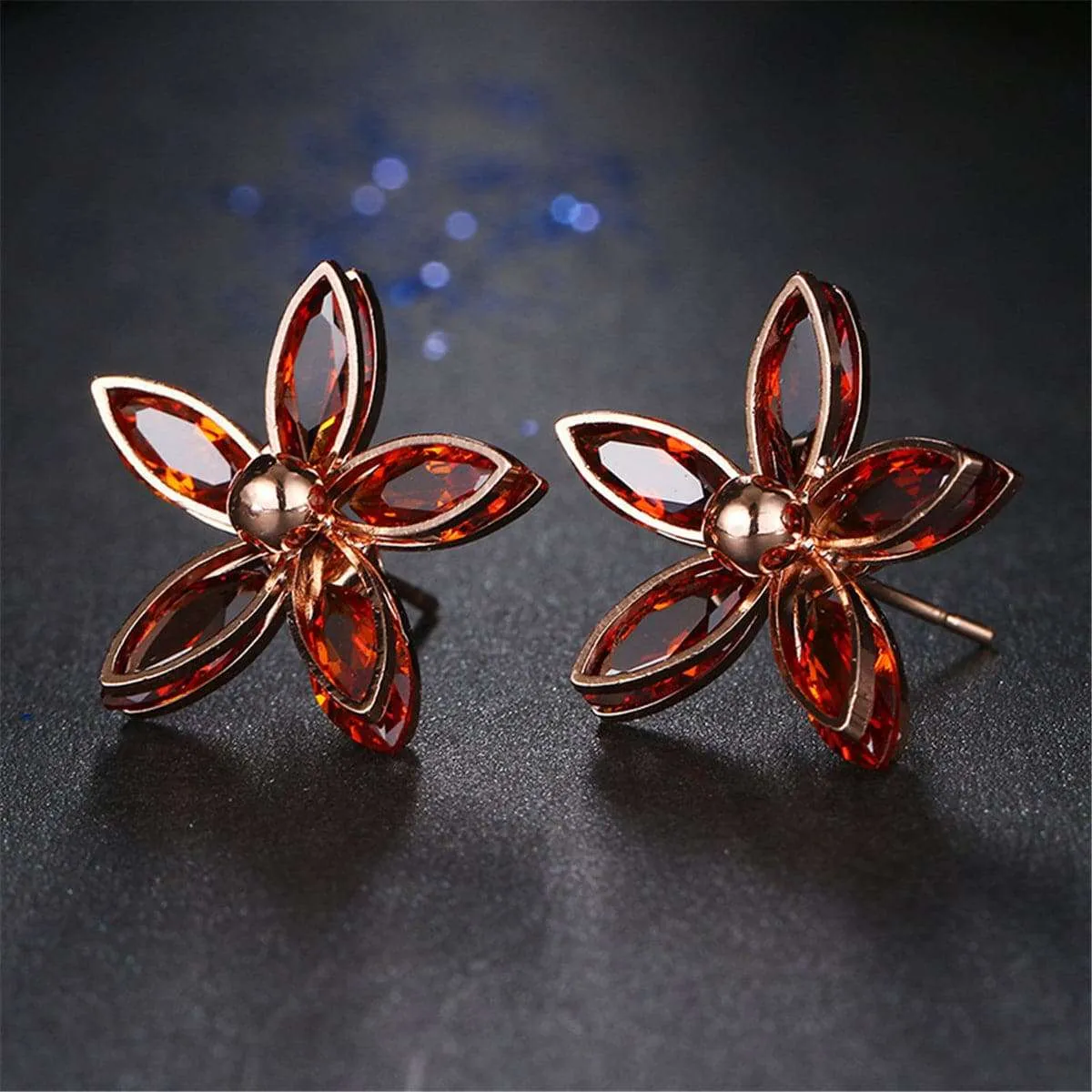 Red Crystal & Rose Goldtone Floral Stud Earrings sold by Zulily product image thumbnail 2