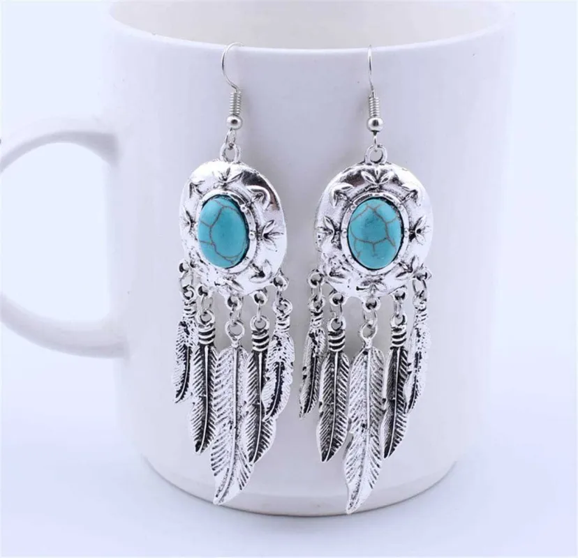 Turquoise & Silvertone Feather Drop Earrings made by Zulily