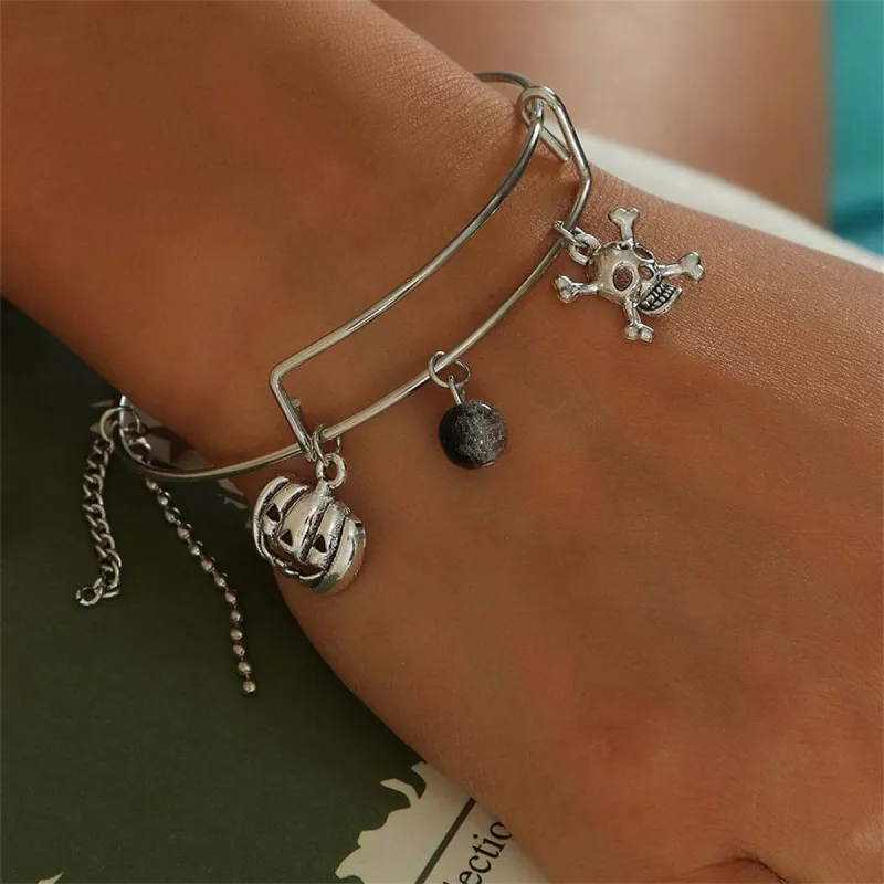 Black Glass & Silvertone Pumpkin Skull Charm Adjustable Bangle made by Zulily