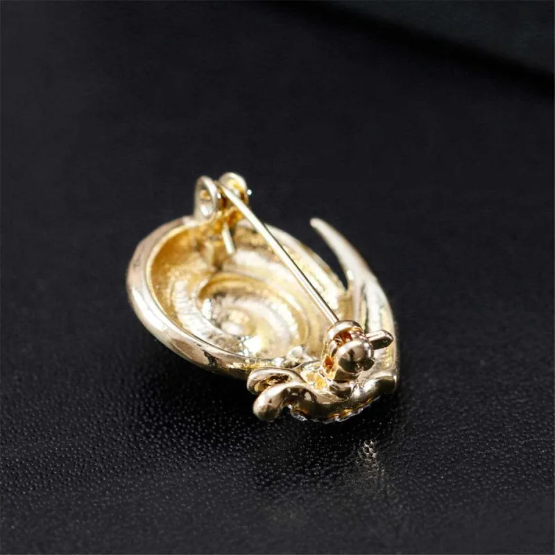 Cubic Zirconia & Goldtone Snail Brooch made by Zulily