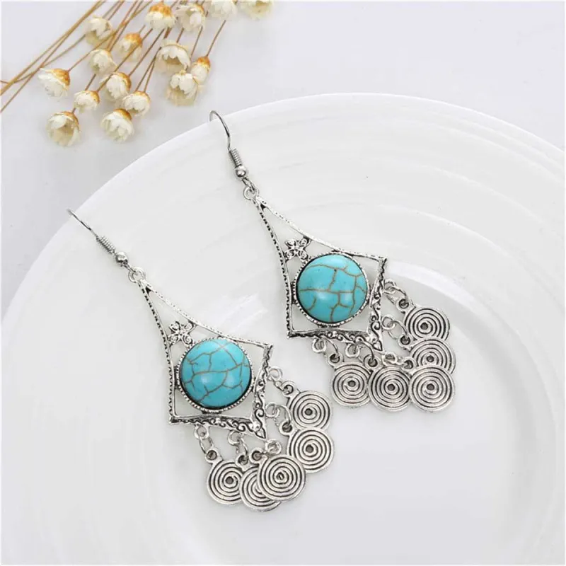 Turquoise & Silvertone Vortex Drop Earrings made by Zulily
