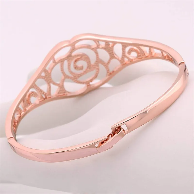 Rose Goldtone Openwork Rose Bangle made by Zulily