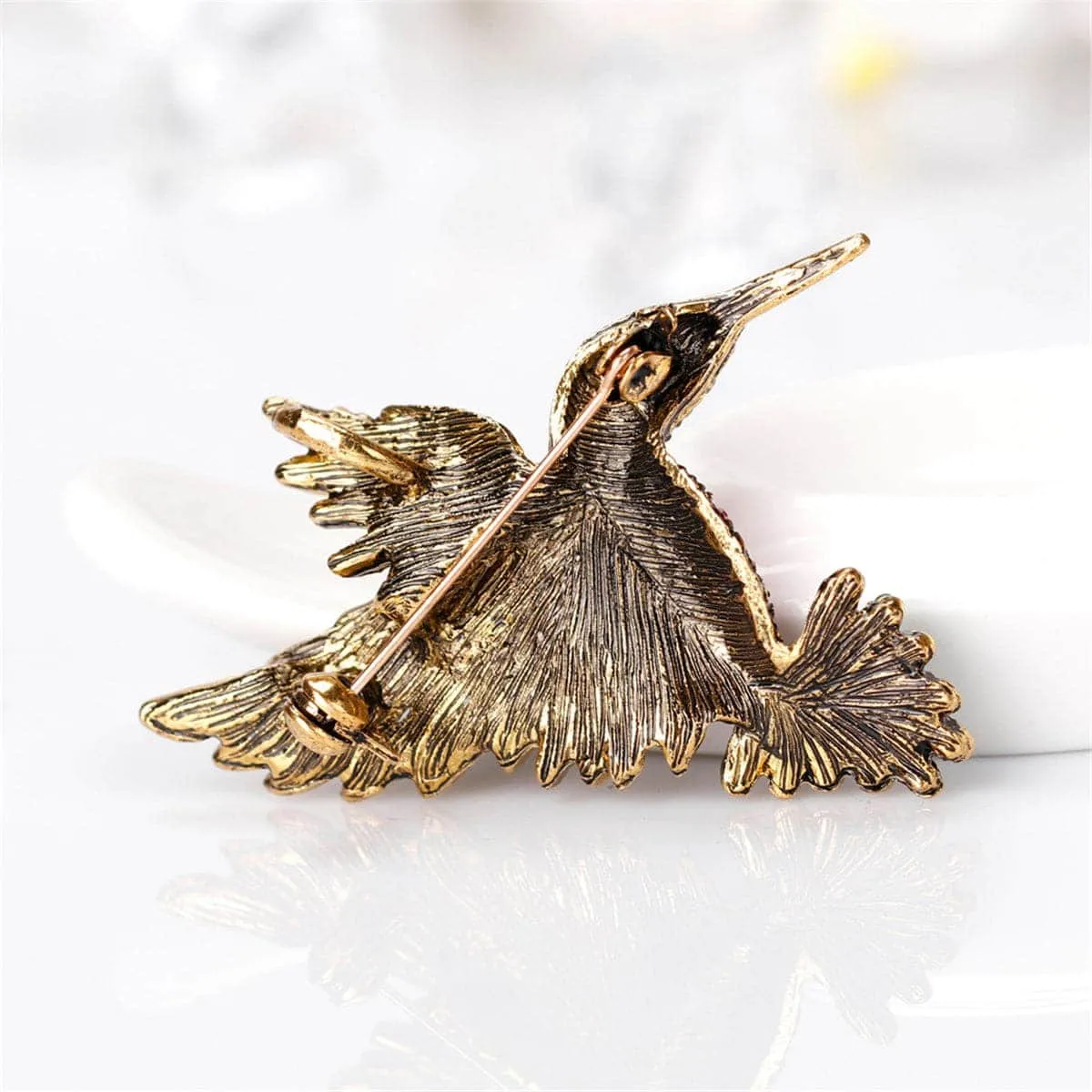Pink & Blue Cubic Zirconia Woodpecker Brooch sold by Zulily