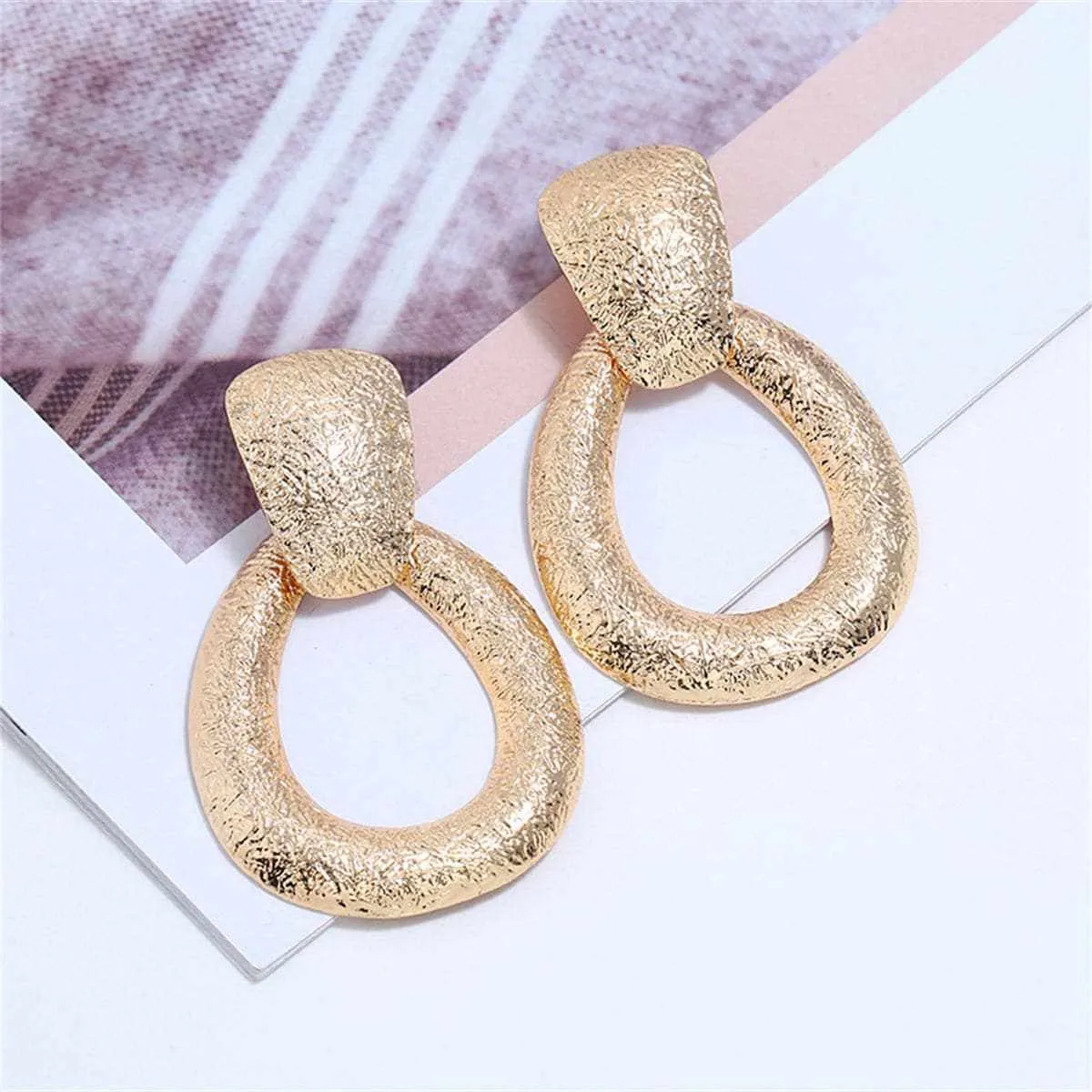 Goldtone Texture Drop Earrings sold by Zulily product image thumbnail 2