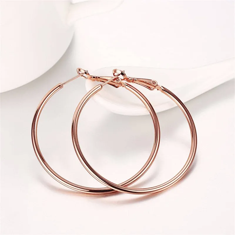 Rose Goldtone Hoop Earrings made by Zulily