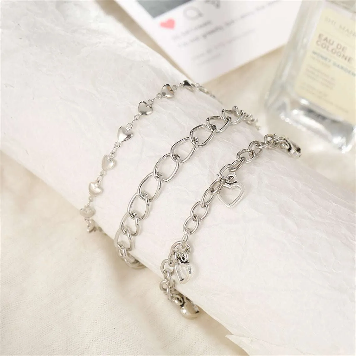 Silvertone Openwork Heart Station Charm Anklet Set sold by Zulily product image thumbnail 2