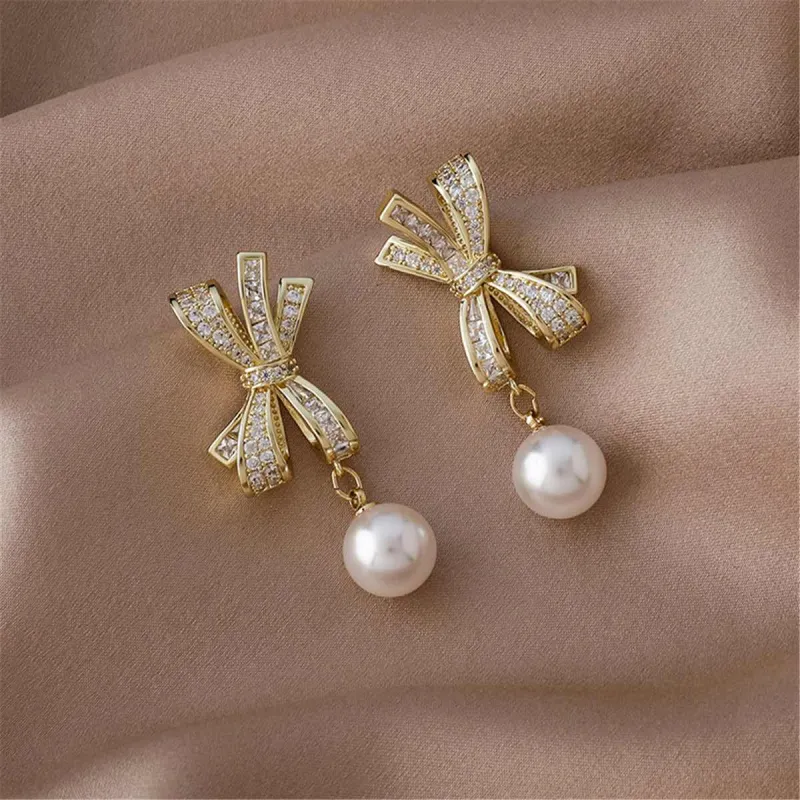 Cubic Zirconia & Pearl Goldtone Bow Dangle Drop Earrings made by Zulily