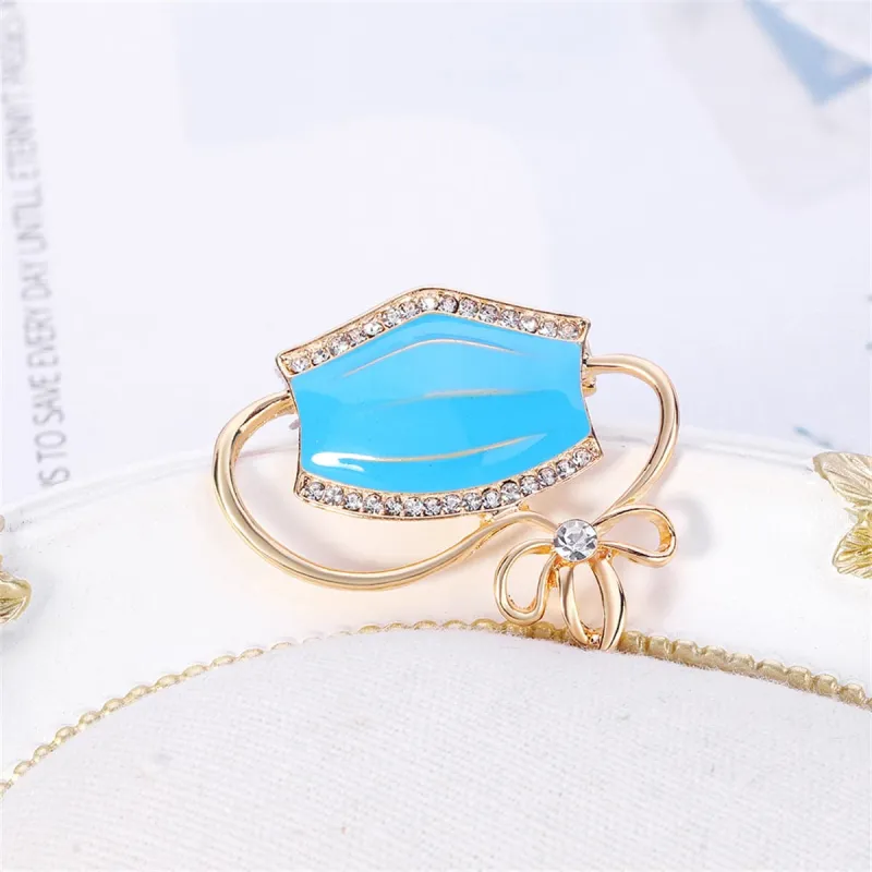 Clear Cubic Zirconia & Blue Enamel Mask Brooch made by Zulily
