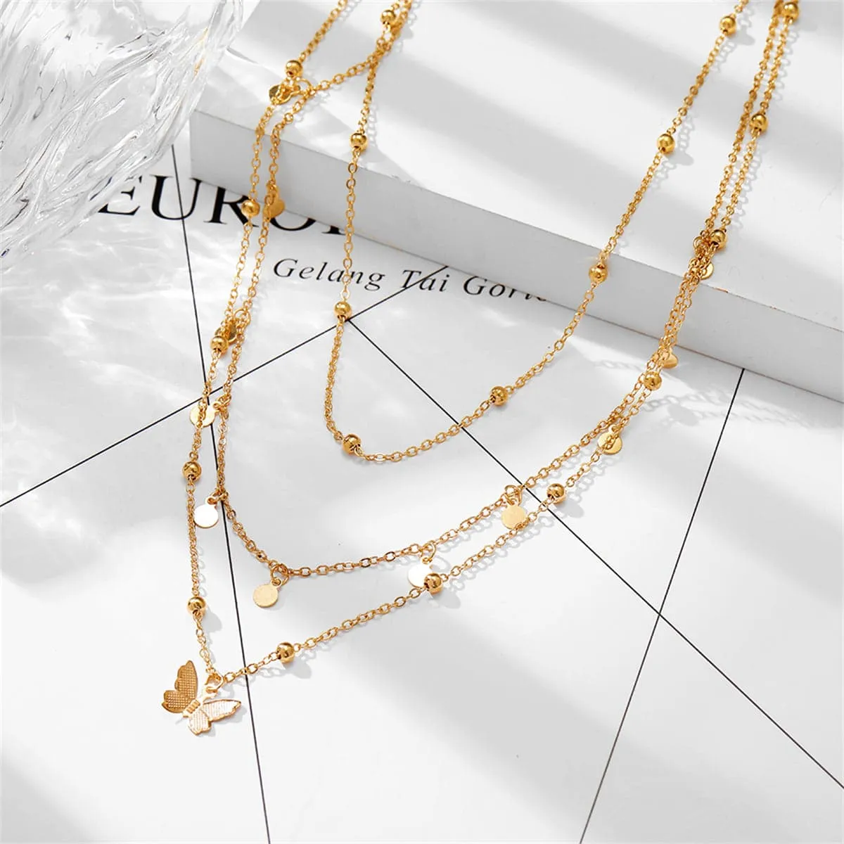 Goldtone Butterfly Layered Station Necklace sold by Zulily product image thumbnail 2