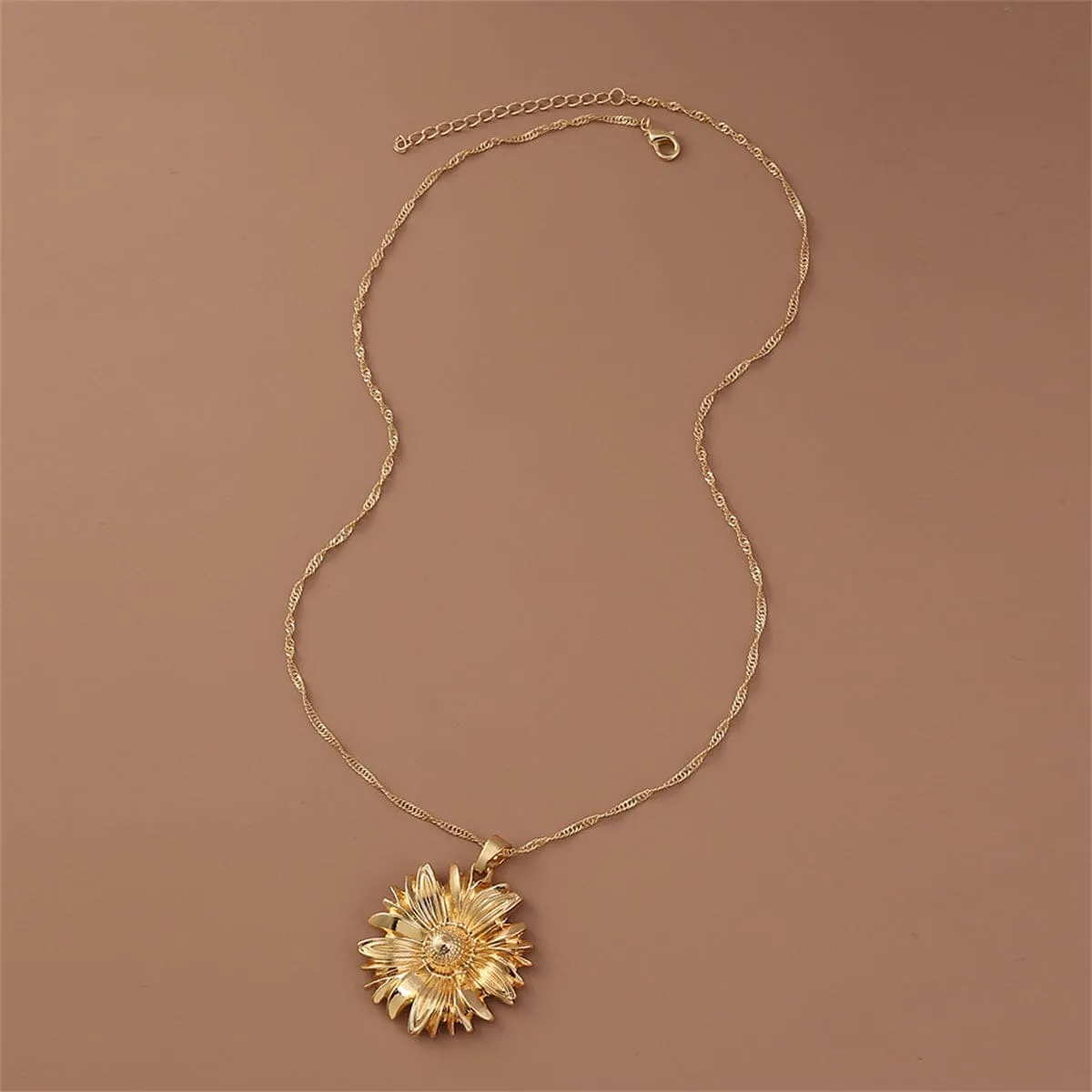 Goldtone Mum Pendant Necklace sold by Zulily