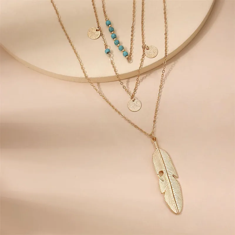 Turquoise & Goldtone Feather Layered Pendant Necklace made by Zulily