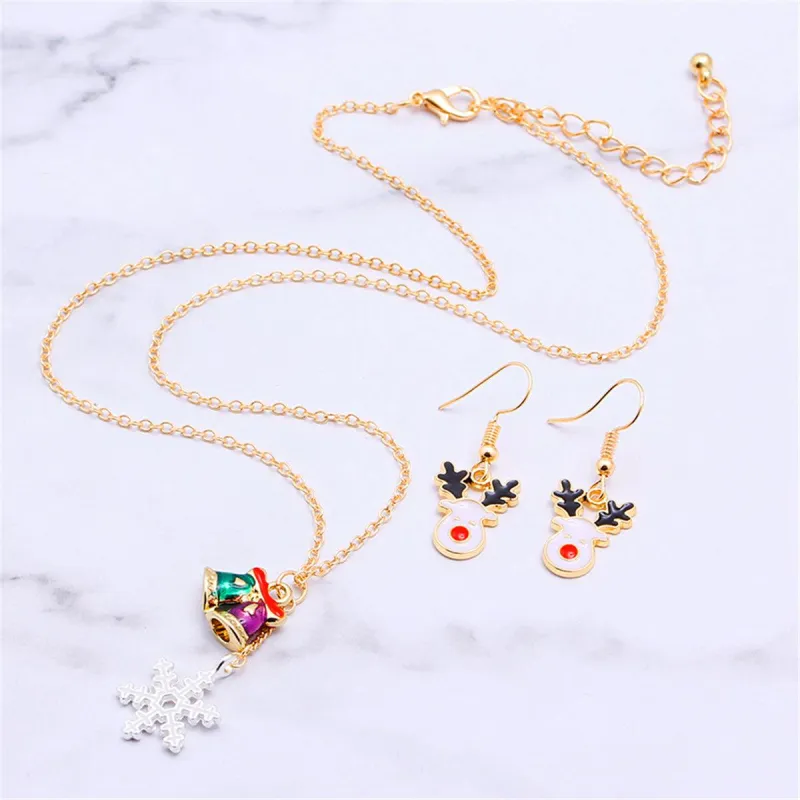 White & Goldtone Reindeer Earrings & Snowflake Pendant Necklace made by Zulily