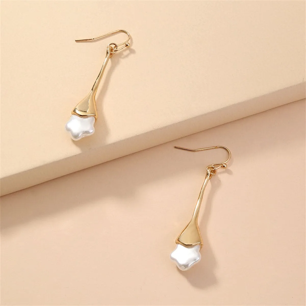 Pearl & Goldtone Star Drop Earrings sold by Zulily