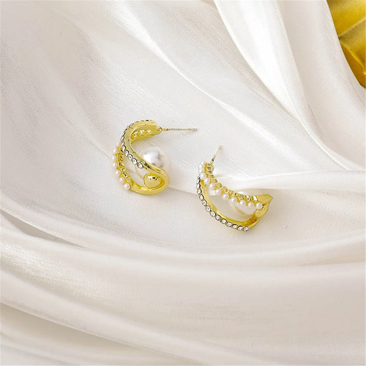 Pearl & Cubic Zirconia Curve Huggie Earrings sold by Zulily product image thumbnail 2