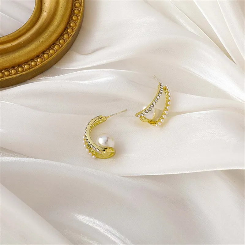 Pearl & Cubic Zirconia Curve Huggie Earrings made by Zulily
