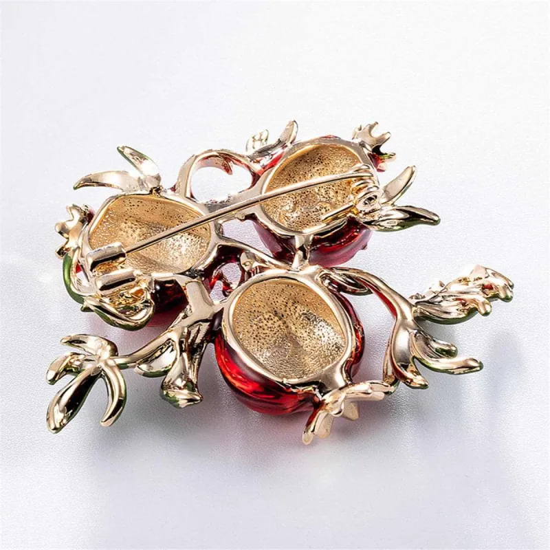 Red & Green Goldtone Pomegranate Brooch made by Zulily