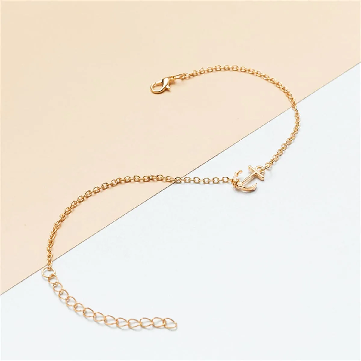 Goldtone Anchor Charm Anklet sold by Zulily