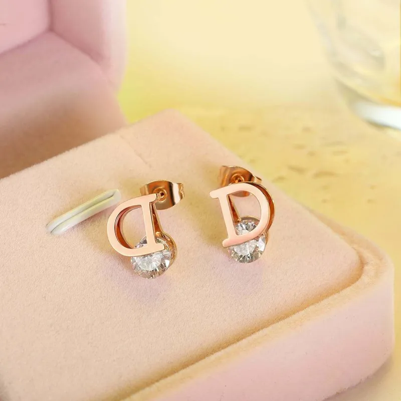 Crystal & Rose Goldtone 'D' Stud Earrings made by Zulily