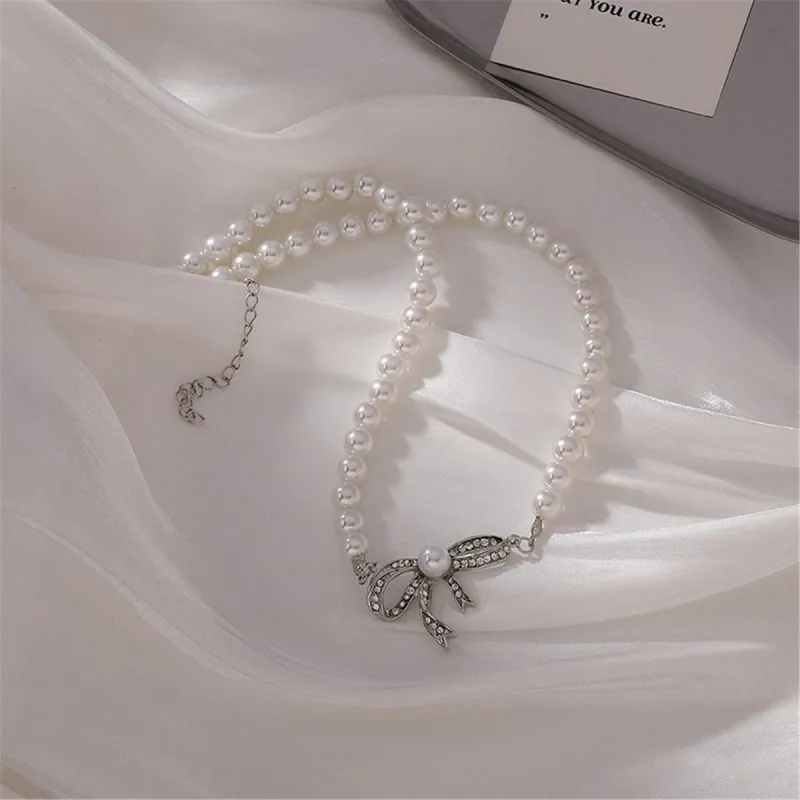 Cubic Zirconia & Pearl Beaded Bow Pendant Necklace made by Zulily