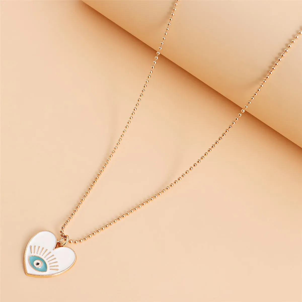 Pearl & Enamel Goldtone Eye Heart Pendant Necklace Set sold by Zulily product image thumbnail 2