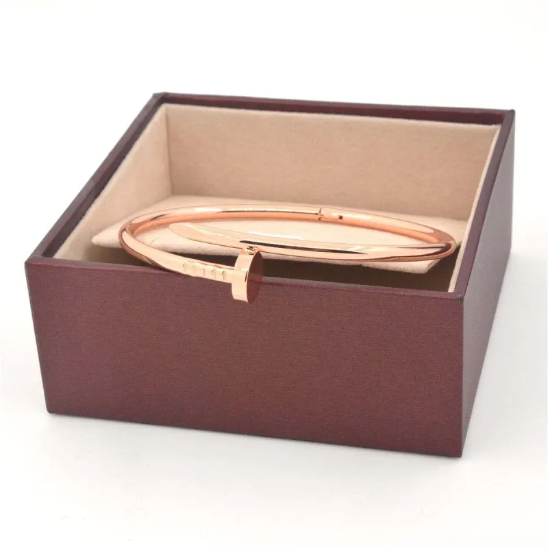 Rose Goldtone Screw Bangle made by Zulily
