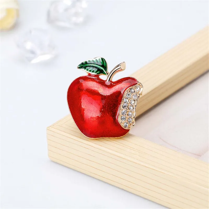 Cubic Zirconia & Goldtone Bitten Apple Brooch made by Zulily