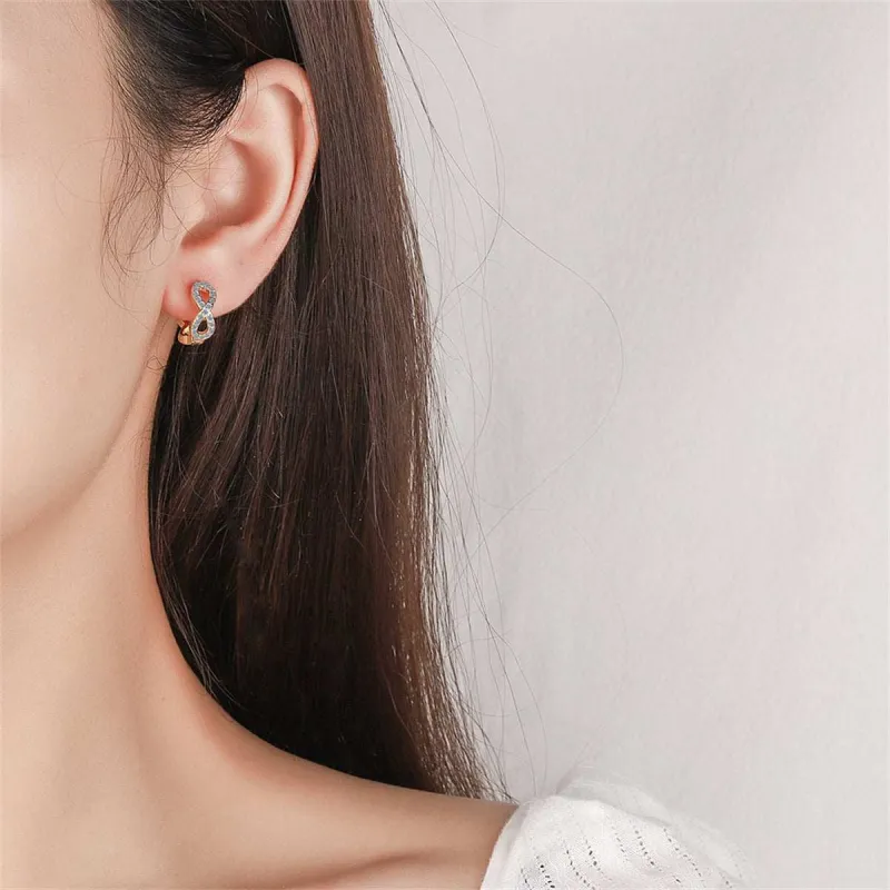 Cubic Zirconia & Goldtone Infinity Huggie Earrings made by Zulily