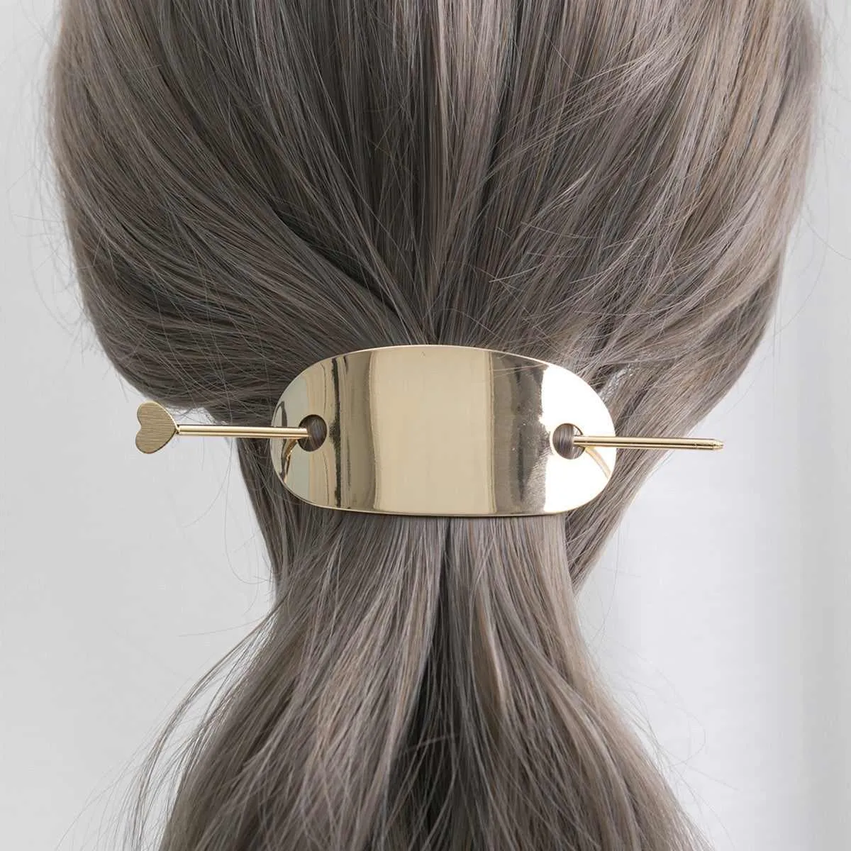 Goldtone Curved Plate & Stick Hair Clip sold by Zulily