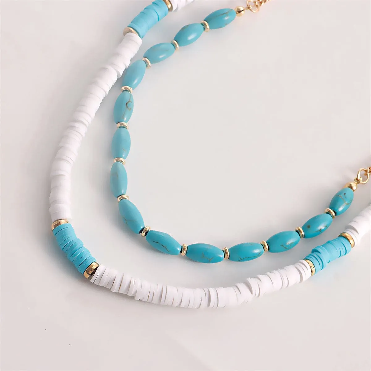 Turquoise & White Polymer Clay Goldtone Heart Layered Pendant Necklace Set sold by Zulily